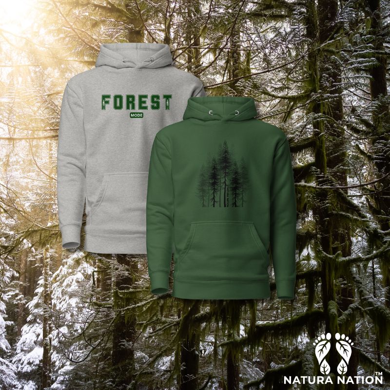 Hoodies with Trees and Tree Hoodies Displayed on a Pine Forest with Snow background by Natura Nation.
