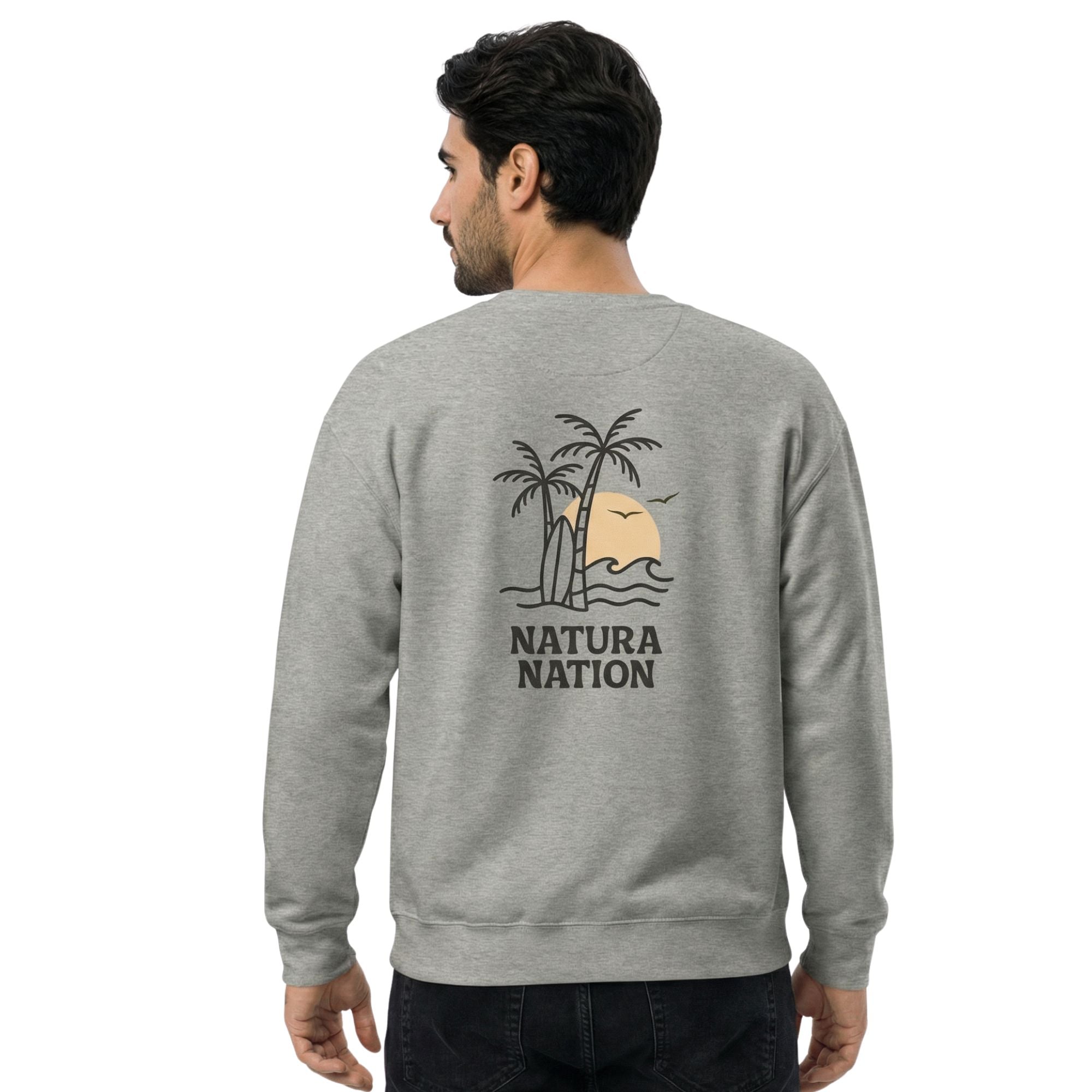 Male model wearing a comfortable Carbon Grey Nature sweatshirt with the 'Tropical Dreams' graphic. Perfect Ocean Clothing for cozy, relaxed moments by the water.