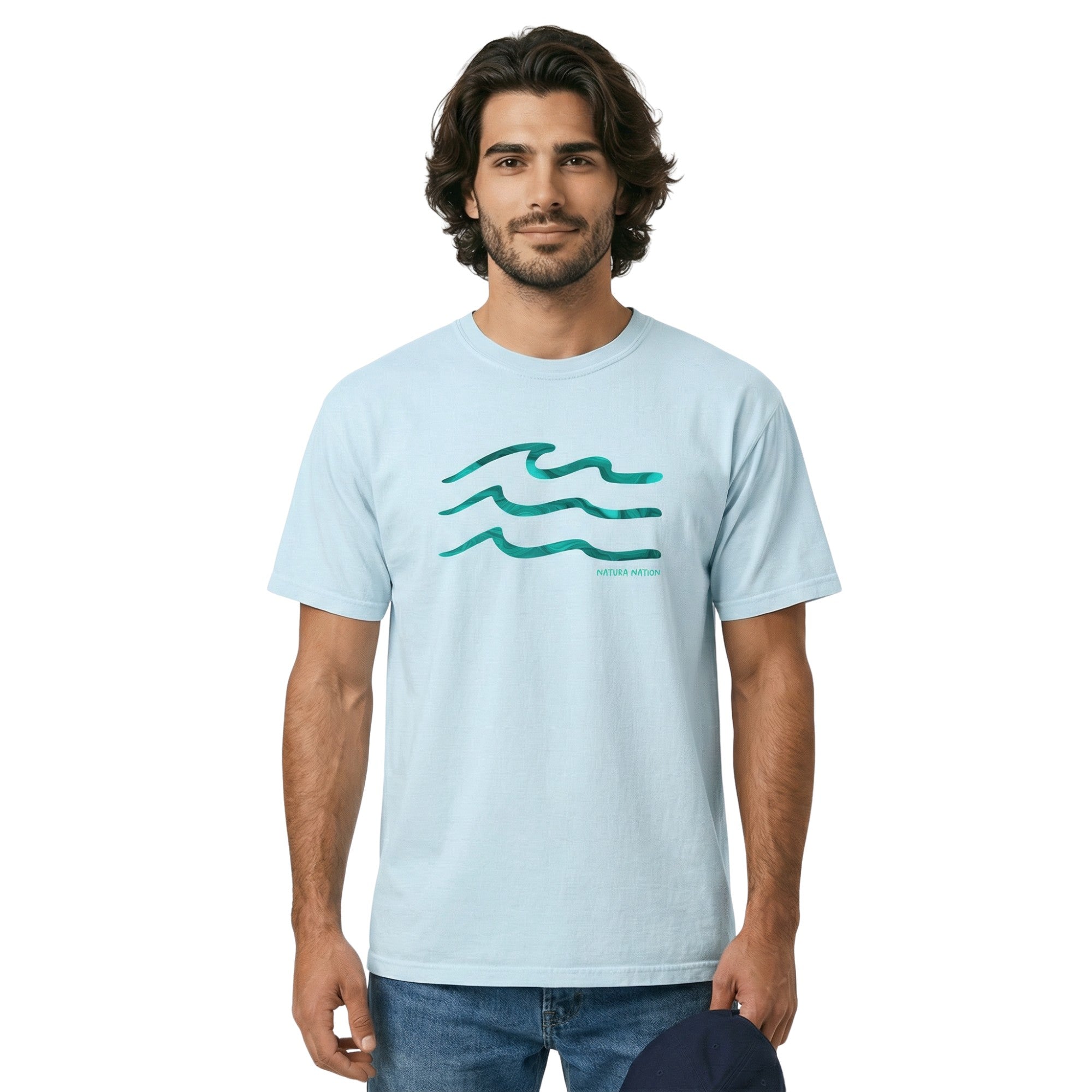 Man wearing a chambray Ocean T-Shirt featuring the Serenity Waves design. This light Ocean Clothing is perfect for breezy coastal days by Natura Nation.