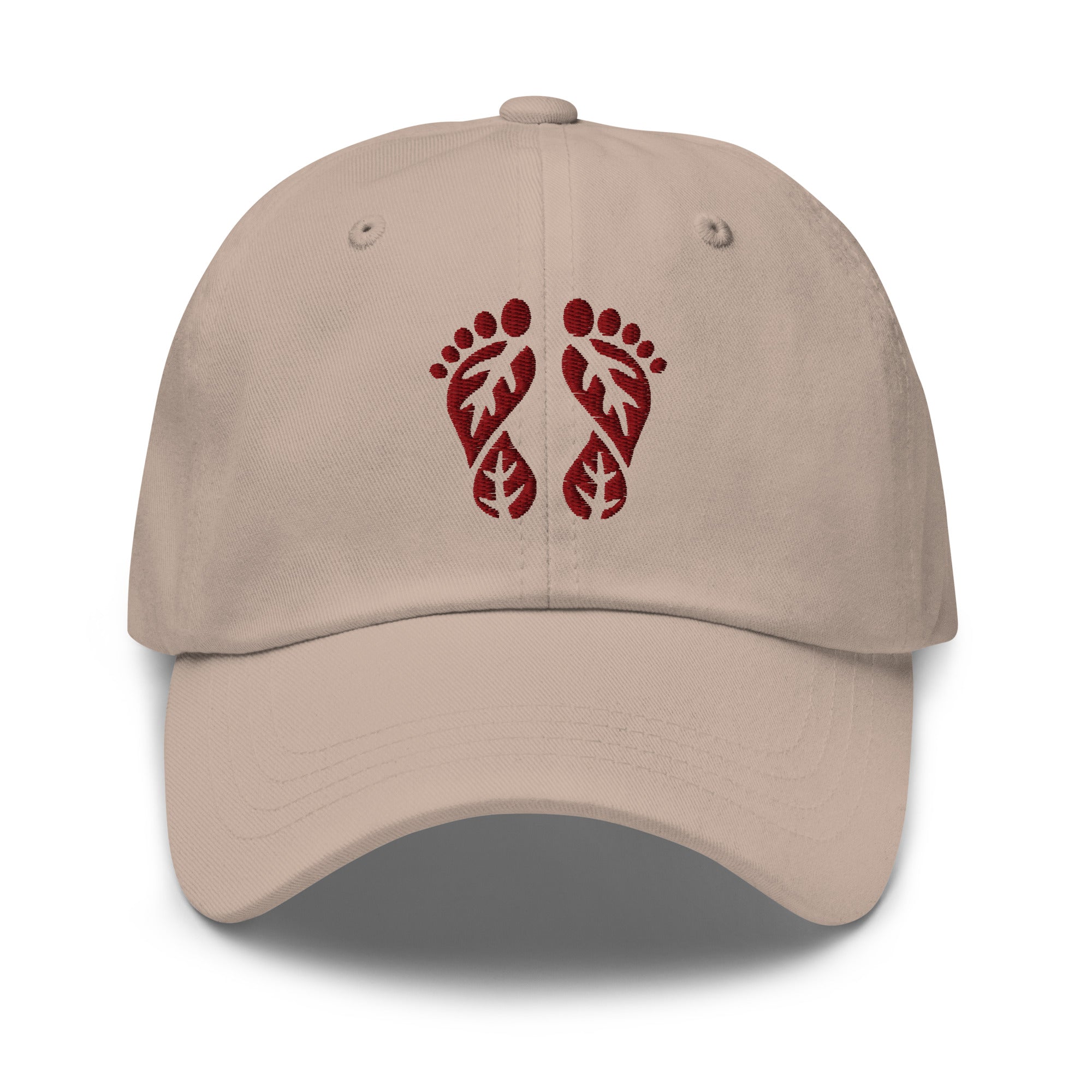 Stone Nature Hat featuring the 'Natura's Footprints' embroidered logo. This neutral Nature Dad Hat offers subtle outdoor style. A versatile piece of Nature Clothing.