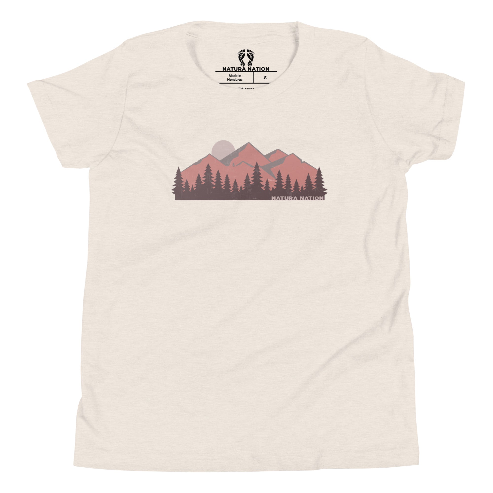 An off-white heather dust teens t-shirt featuring a graphic of a mountain range and pine trees in muted pink, brown, and gray tones, with the 'Natura Nation' brand logo printed inside the collar.
