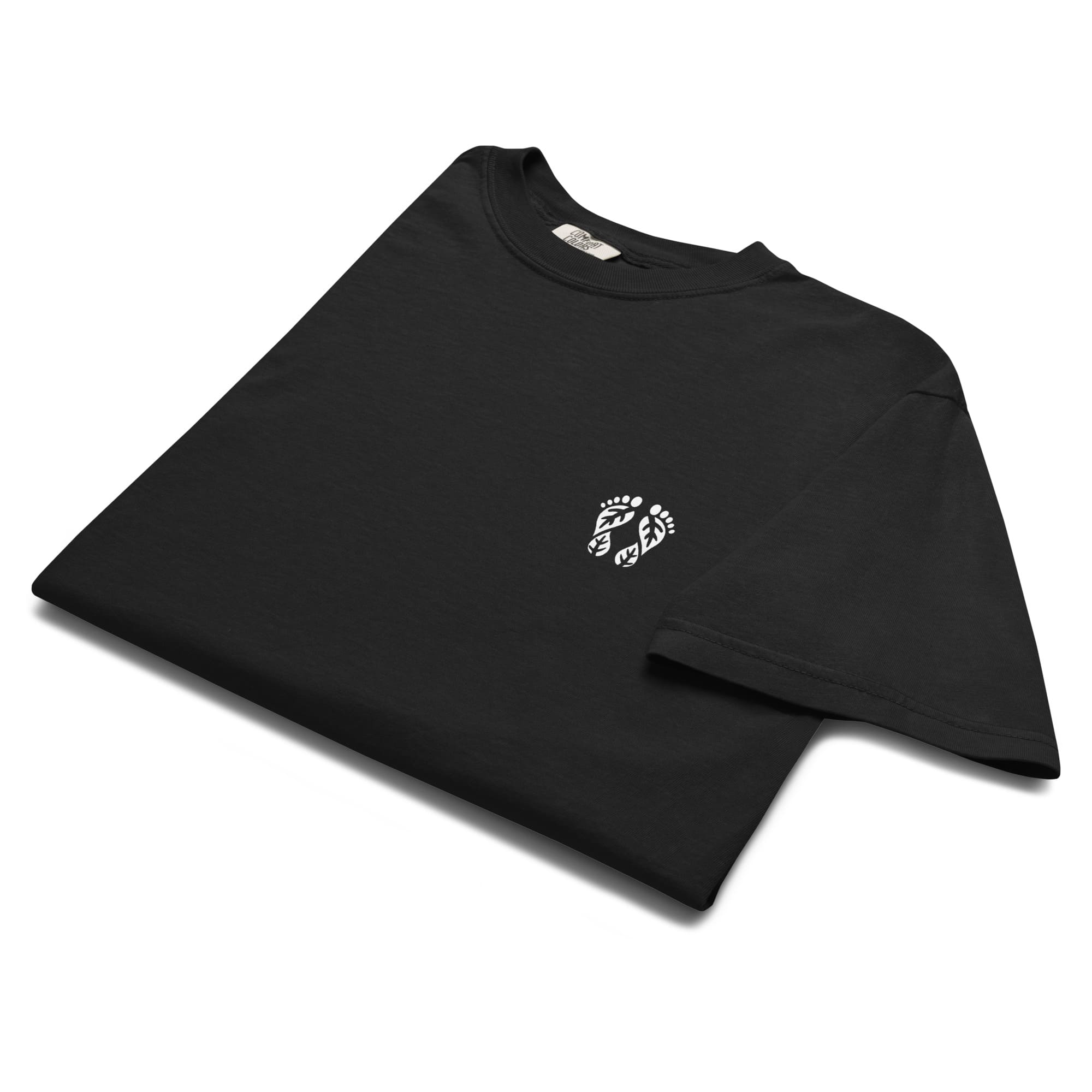Black Nature T-shirt featuring the 'Natura's Footprints' logo on the front. A sleek piece of nature clothing for timeless style. Made by Natura Nation for nature lovers.