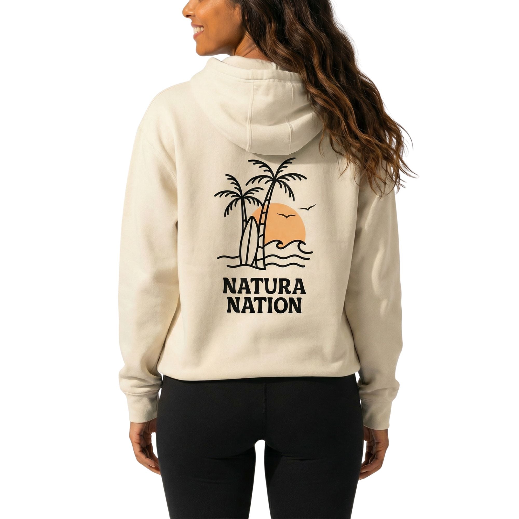  Female model wearing a bone-colored Ocean Hoodie with the 'Tropical Dreams' design. A vibrant Ocean Clothing piece for clear waters.