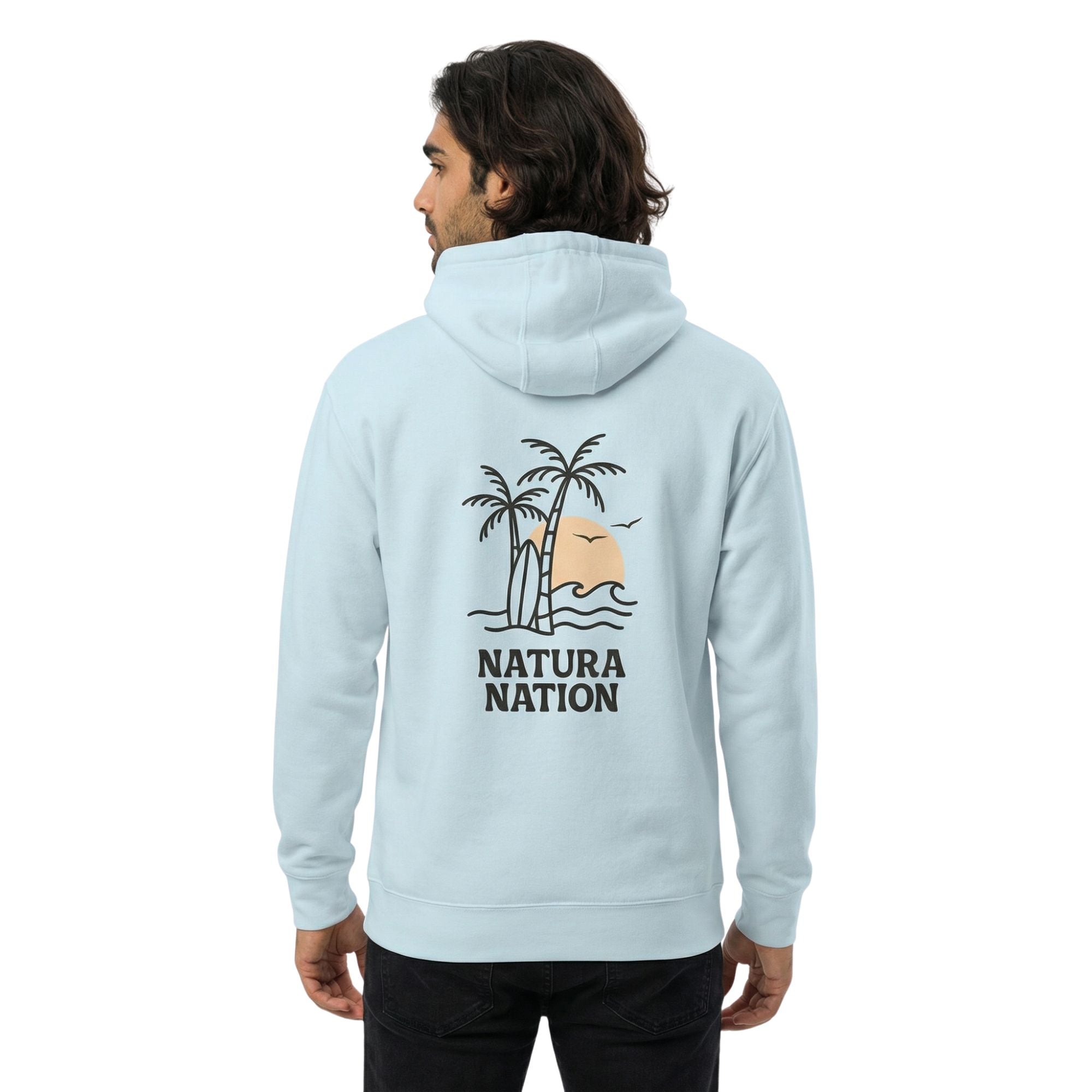 Male model wearing a Sky Blue Ocean Hoodie featuring the 'Tropical Dreams' design on the back by Natura Nation. Perfect Ocean Clothing for sun-drenched days.