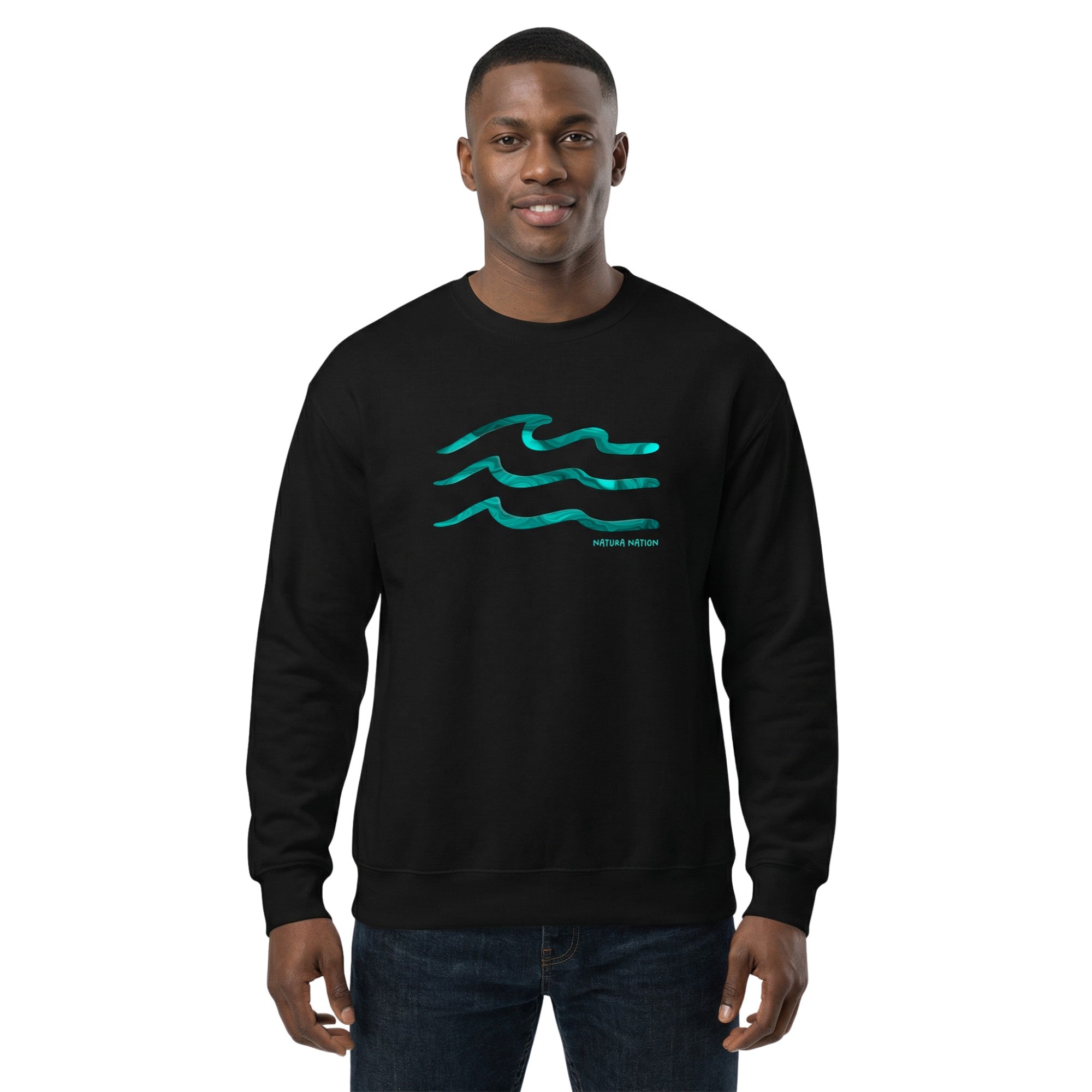 Man wearing a black Ocean Sweatshirt featuring the 'Serenity Waves' design. This pristine Ocean Clothing is perfect for peaceful coastal days. Made by Natura Nation.