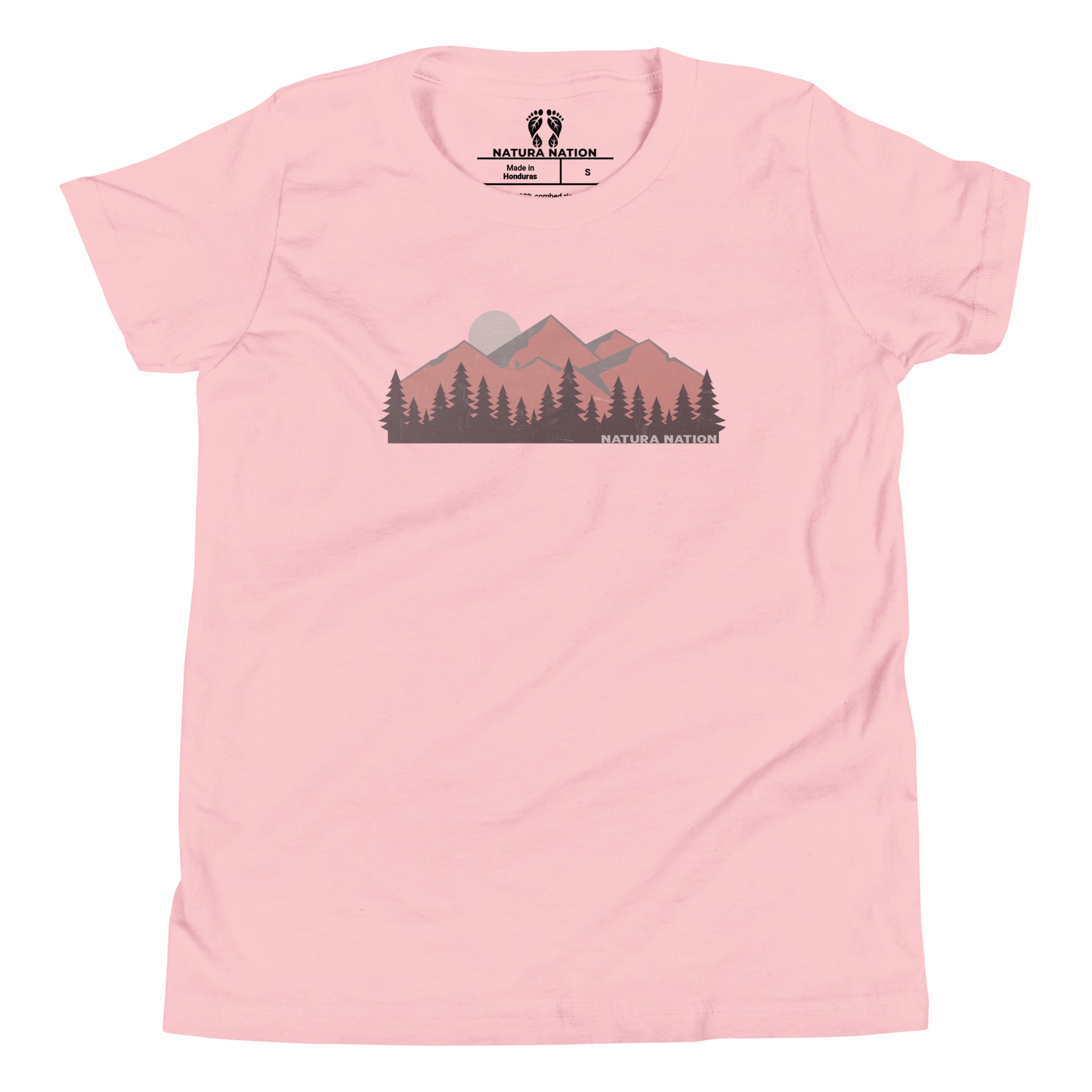 Shirt for teenage guys with a mountain graphic. A light pink short-sleeve crewneck t-shirt featuring a graphic of a mountain range and pine trees on the chest, with the 'Natura's Nation' brand logo printed inside the collar.