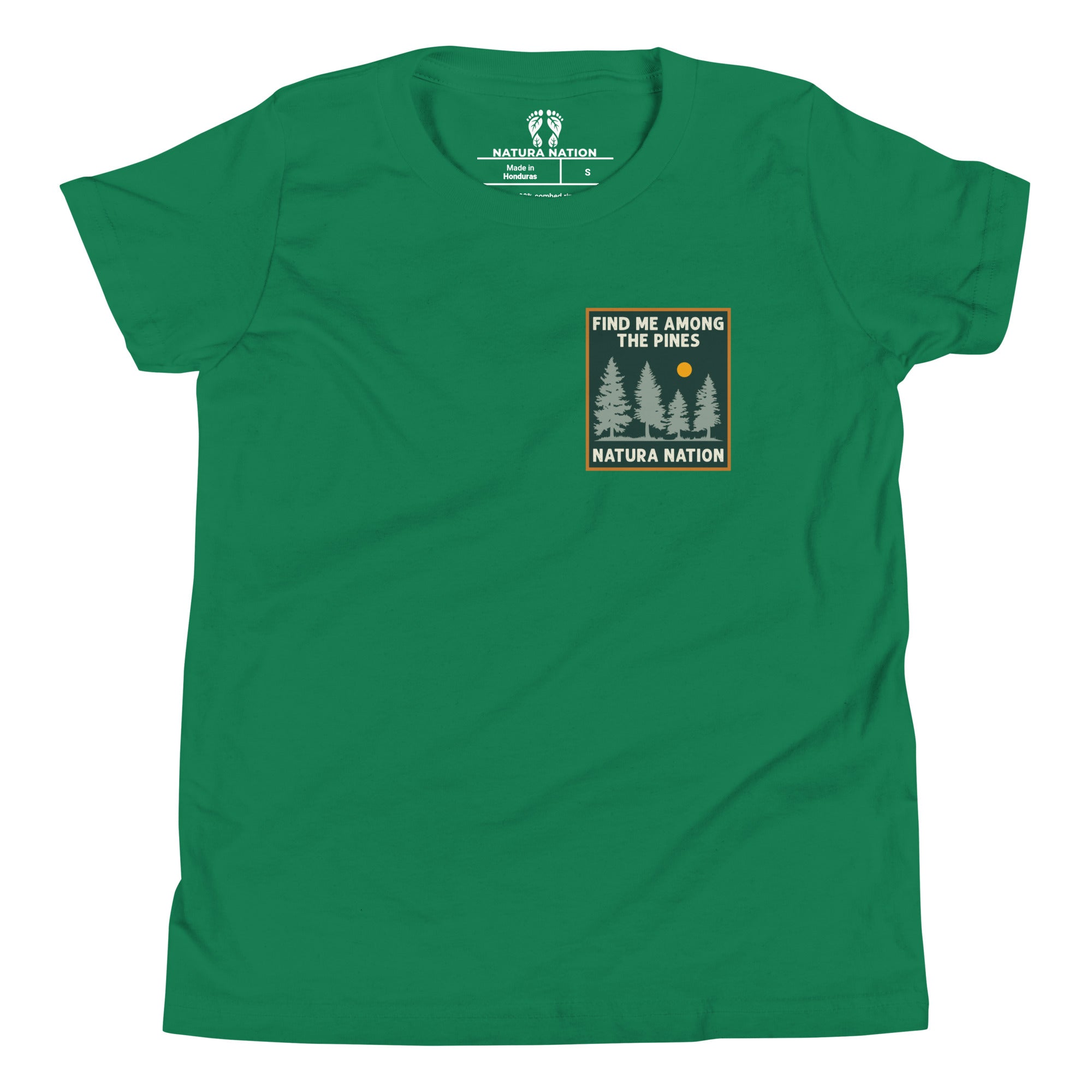 A kelly green short-sleeve teen and youth crewneck t-shirt featuring a chest graphic with pine trees, a sun, and the text 'FIND ME AMONG THE PINES' and 'NATURA NATION'. The inside collar shows the brand 'Natura Nation'.