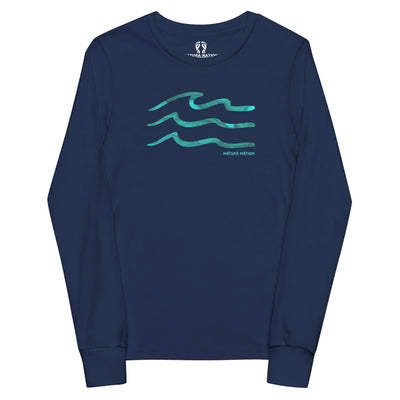 A navy blue long-sleeve t-shirt with a teal graphic of three wavy lines and the text 'NATURA NATION' on the chest, displayed on a solid white background. Youth ocean long sleeve T-shirt with a rolling wave design for kids.