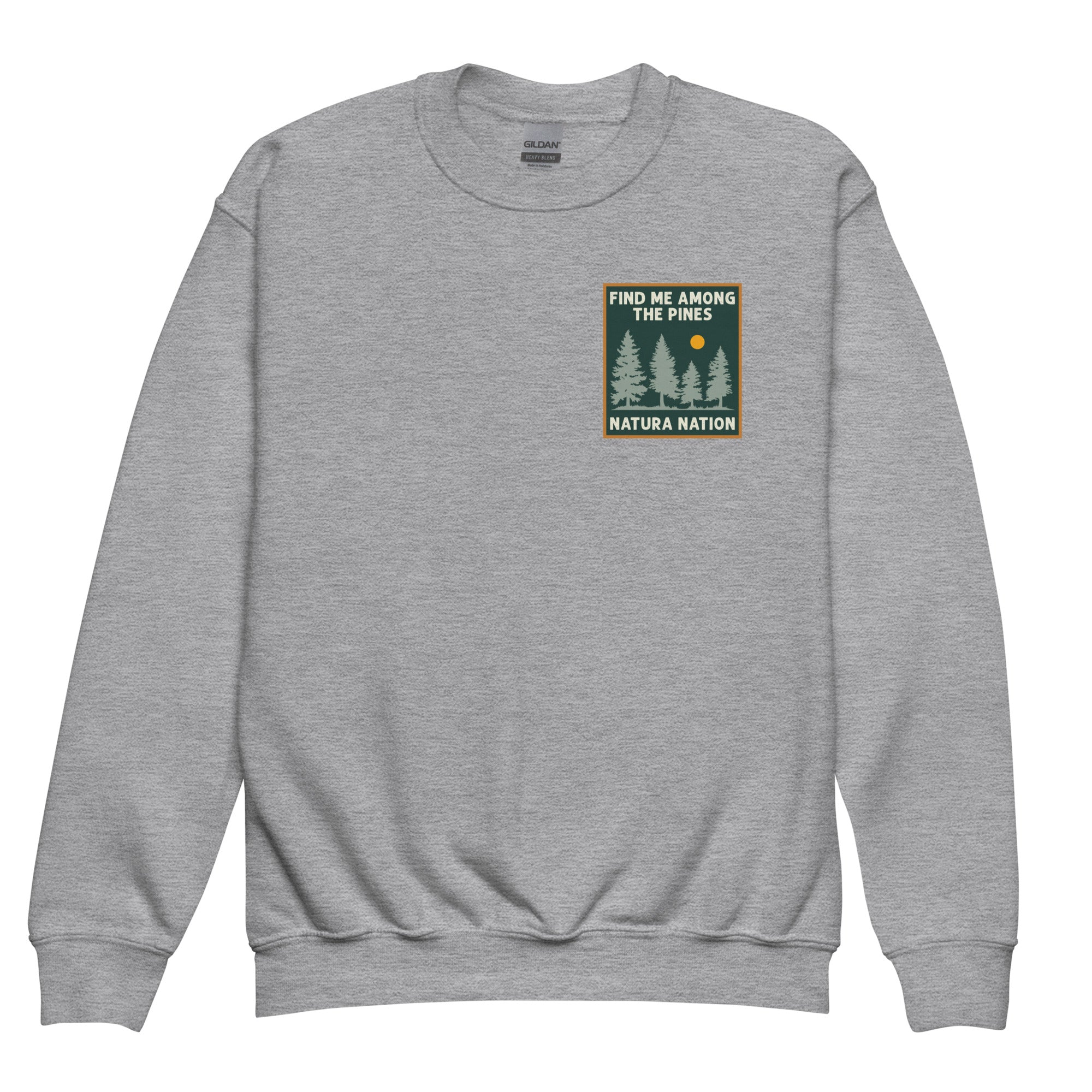A sport gray crewneck sweatshirt featuring a square chest graphic with pine trees, a yellow sun, and the text 'FIND ME AMONG THE PINES' and 'NATURA NATION'. Youth pine sweatshirt with a tall pine tree design on the front for kids.