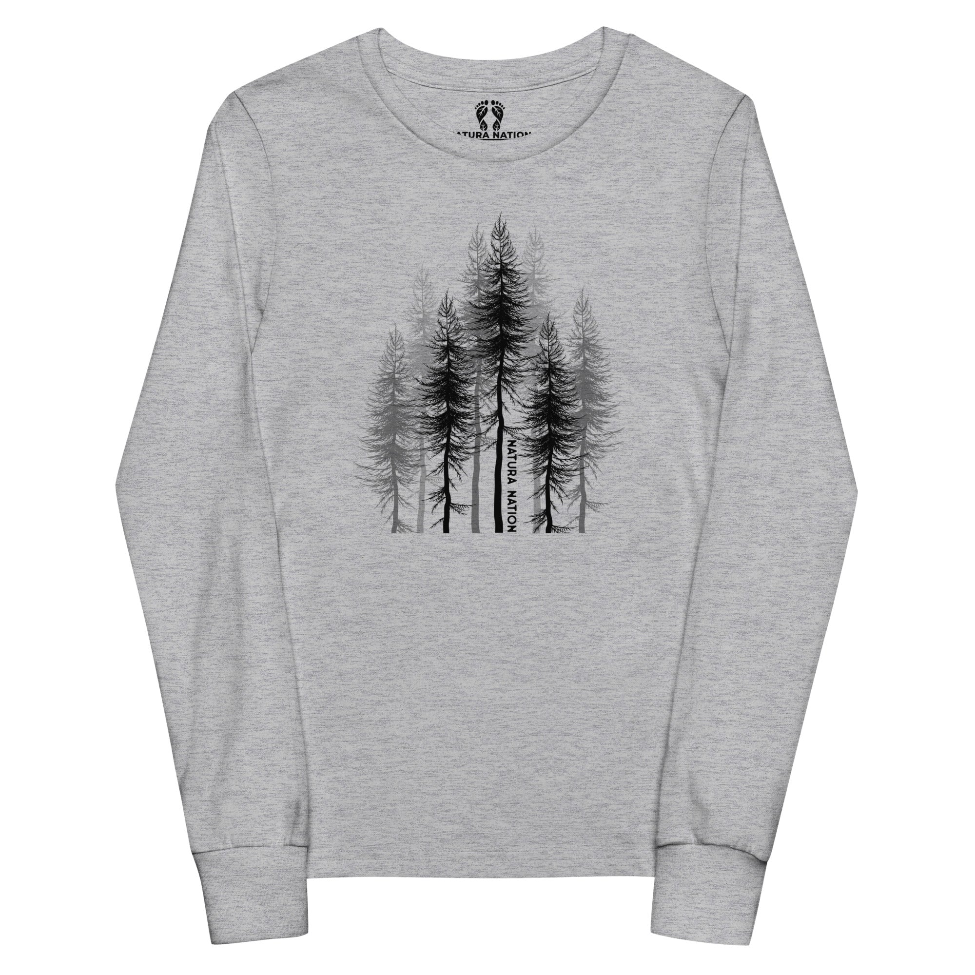 Youth pine trees long-sleeved t-shirt, front view. A light athletic heather gray long-sleeve t-shirt with a black graphic of pine trees on the chest, featuring the brand name 'Natura Nation' printed vertically on one of the tree trunks.