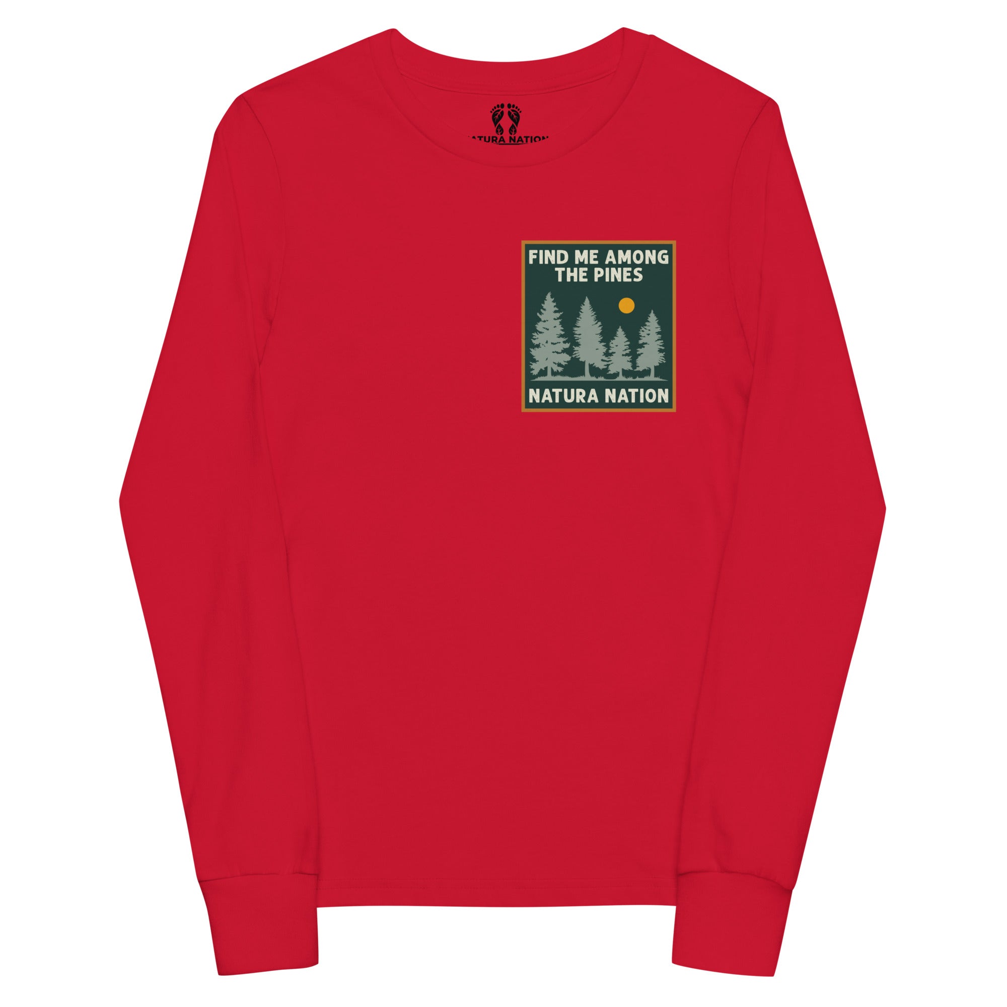 A red long-sleeve crewneck sweatshirt with a small chest graphic. The graphic features a dark green background with pine tree silhouettes, a yellow sun, and the text 'FIND ME AMONG THE PINES' and 'NATURA NATION'.
