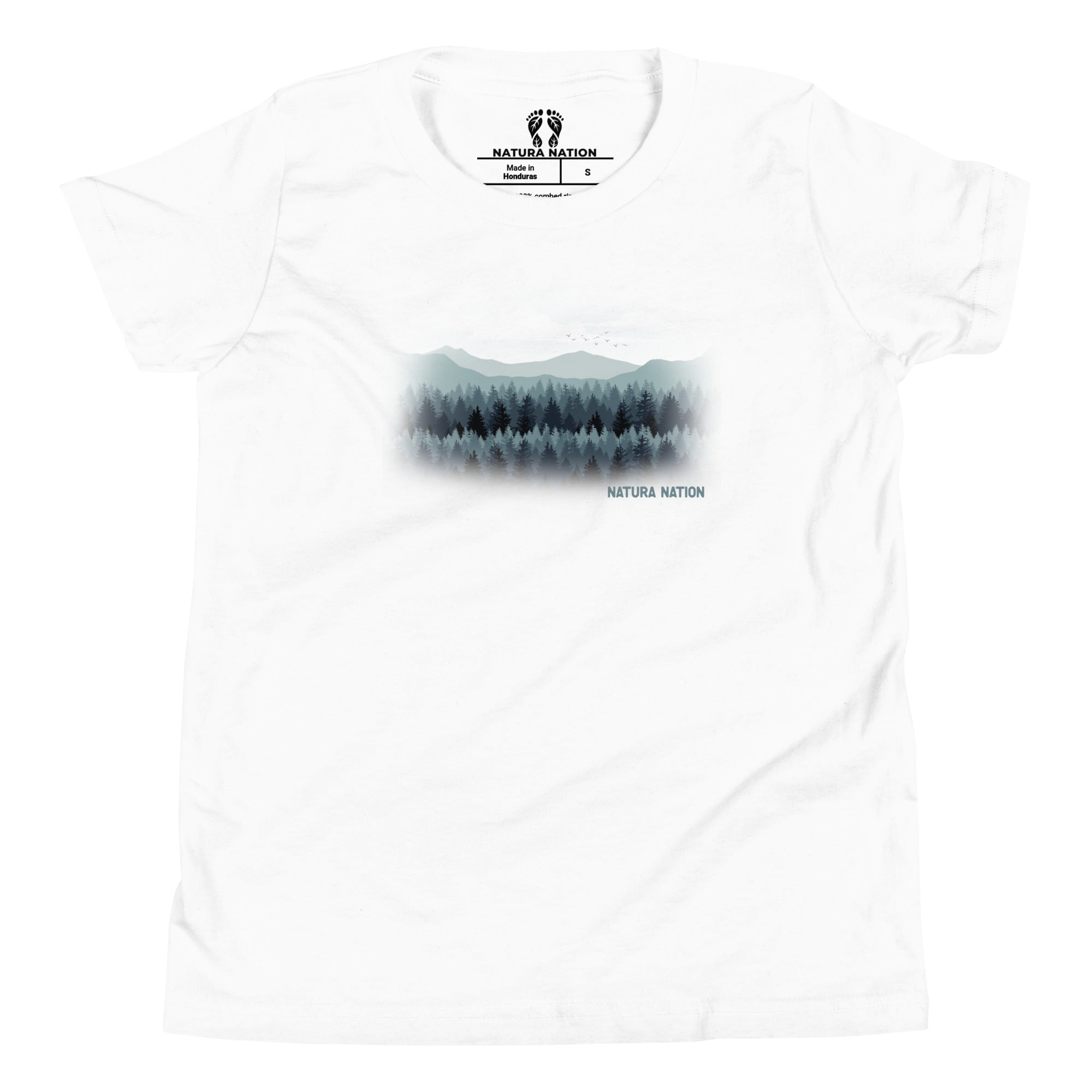 A white short-sleeve crewneck teen t-shirt featuring a misty mountain and forest graphic on the chest, with the 'NATURA NATION' brand logo printed inside the collar.